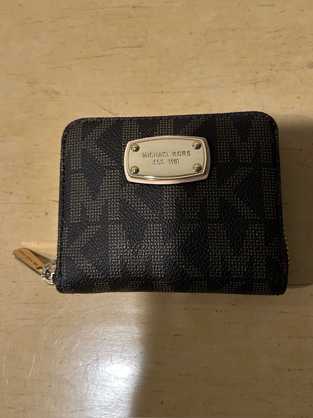Michael Kors classic pebbled jet-set zip around brown wallet